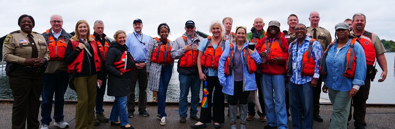group photo outside of the community advisory board
